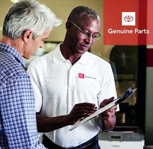 Toyota advisor helping customer | Orem Toyota ES in Orem UT